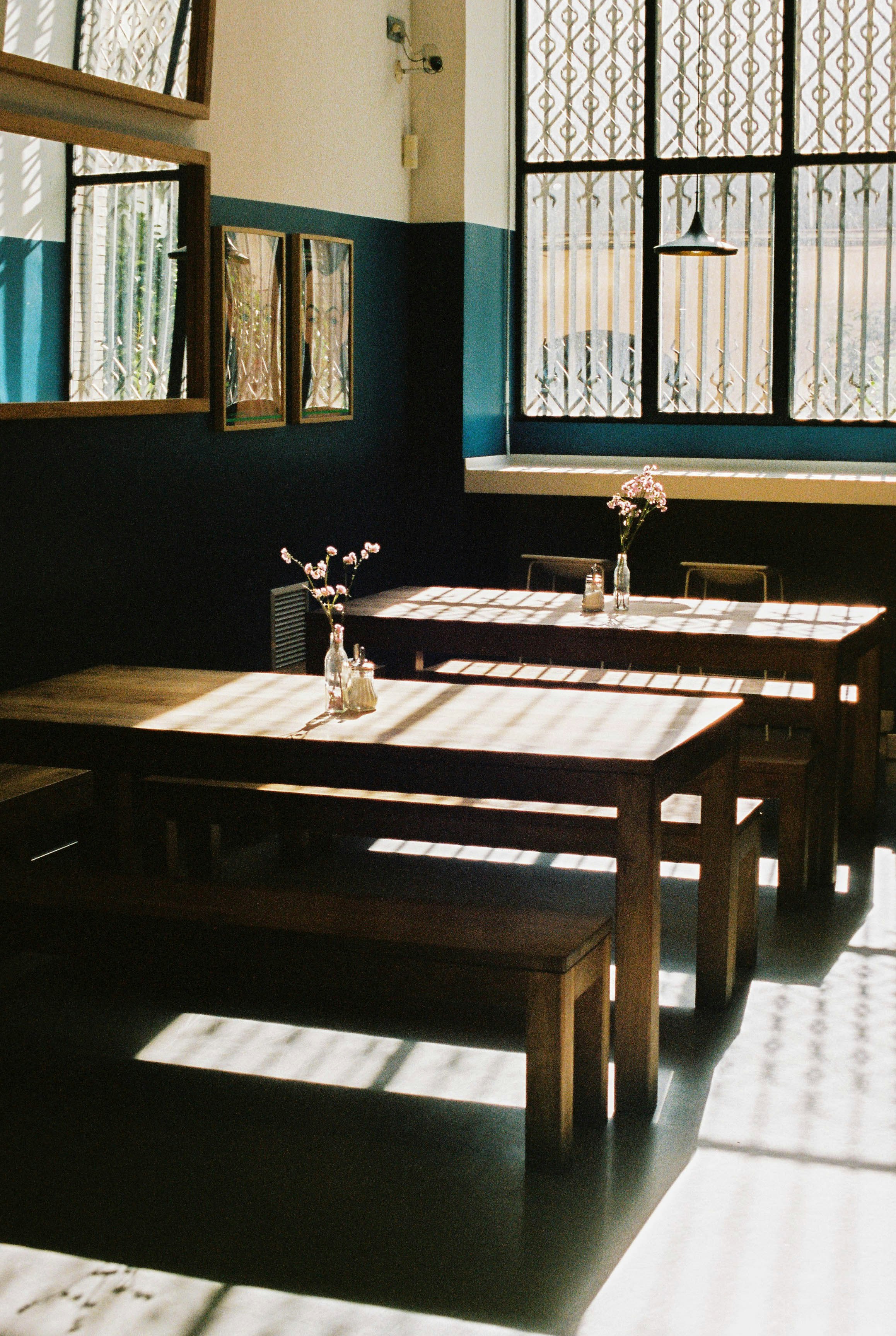 brown wooden dining table with chairs